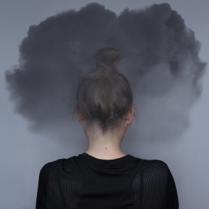 Image of a woman with a grey cloud surrounding her head. Have you been searching for a "trauma therapist near me" due to nightmares and panic attacks in North Carolina? We offer PTSD treatment and therapy for trauma in Asheville, NC 28803. 28801 | 28804 | 28806