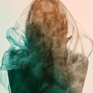 Silhouette of a woman with colors swirling around