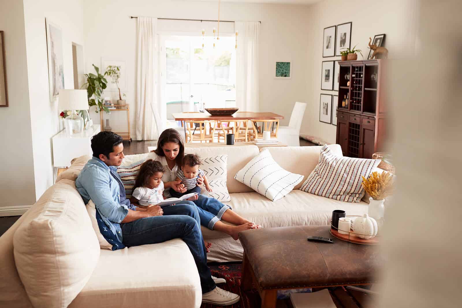 Hispanic family on the couch multicultural counselor