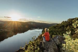 Image of a woman sitting out by a river. Are you looking for anxiety treatment and stress relief? Our NC anxiety therapist can help you. Get started in stress management in North Carolina 28803.