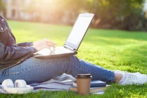 Image of a person sitting outside in a park on a computer. Finding the right online therapist in North Carolina is hard. We can make it easier to find options like neurodivergent therapy and BIPOC Mental Health Resources. It all starts by scheduling your first online therapy appointment. Call today!