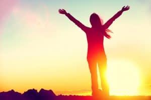 Image of a woman standing in front of a setting sun with her arms out stretched. There are a lot of types of PTSD symptoms. It can be hard to know what to do about them without the guidance of a trauma therapist. The first step to feeling better is starting trauma therapy and PTSD treatment in North Carolina. We can help whether you are in Charlotte, Asheville, Raleigh, or somewhere else. Call today!