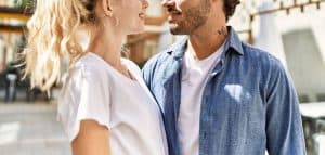 A close up of a couple standing close to one another. Learn how a couples therapist in North Carolina can offer support in improving your relationship. We offer couples therapy in North Carolina along with marriage counseling in North Carolina. Read on to learn more!