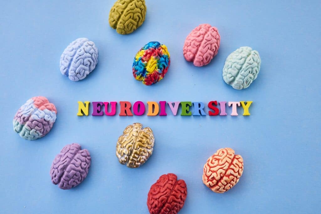 Neurodiversity concept. Multicolored figures of the brain